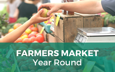 Farmers Market Year Round - image of person's arm holding fruit