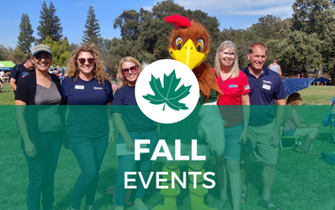 Fall Events - photo of group of people posing with rooster mascot