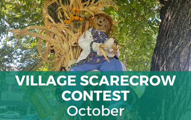 Village Scarecrow Contest - image of scarecrow sitting in a tree