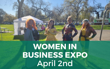 Women dressed in superhero costumes