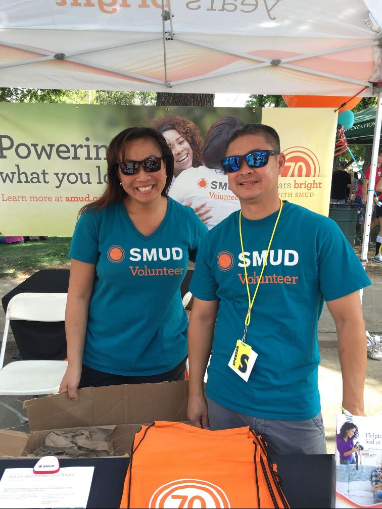 man & woman at SMUD booth